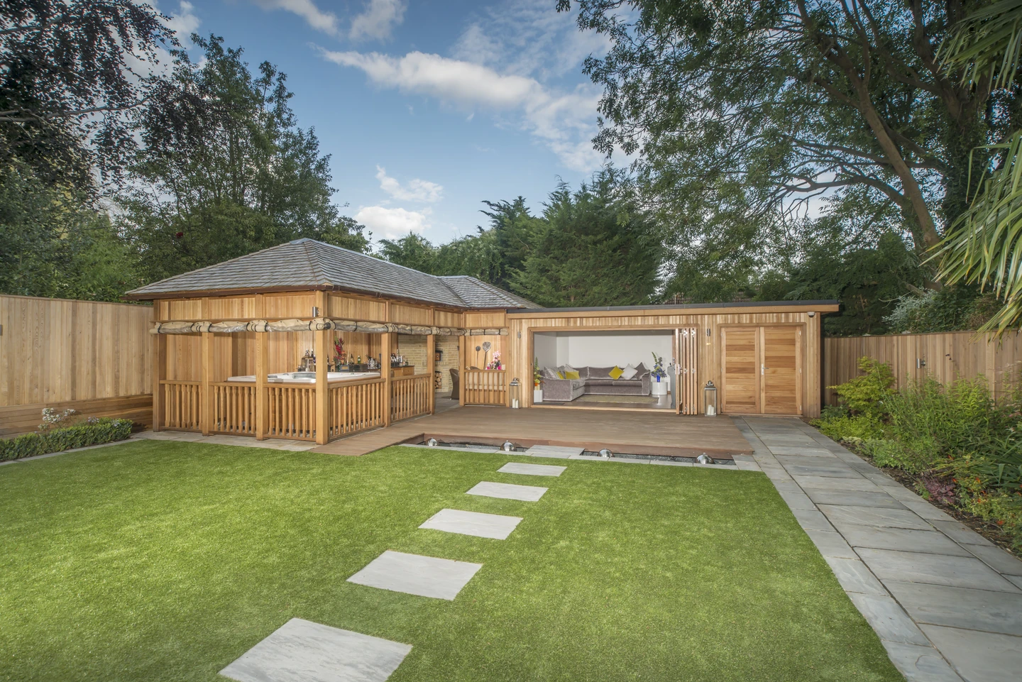 Bespoke garden building complex with hot tub, outdoor kitchen and glazed garden room